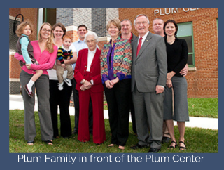 Plum Family in front of the Plum Center.